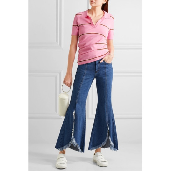 SJYP Denim - SJYP Frayed mid-rise flared jeans